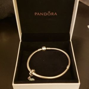 Pandora bracelet with one charm.